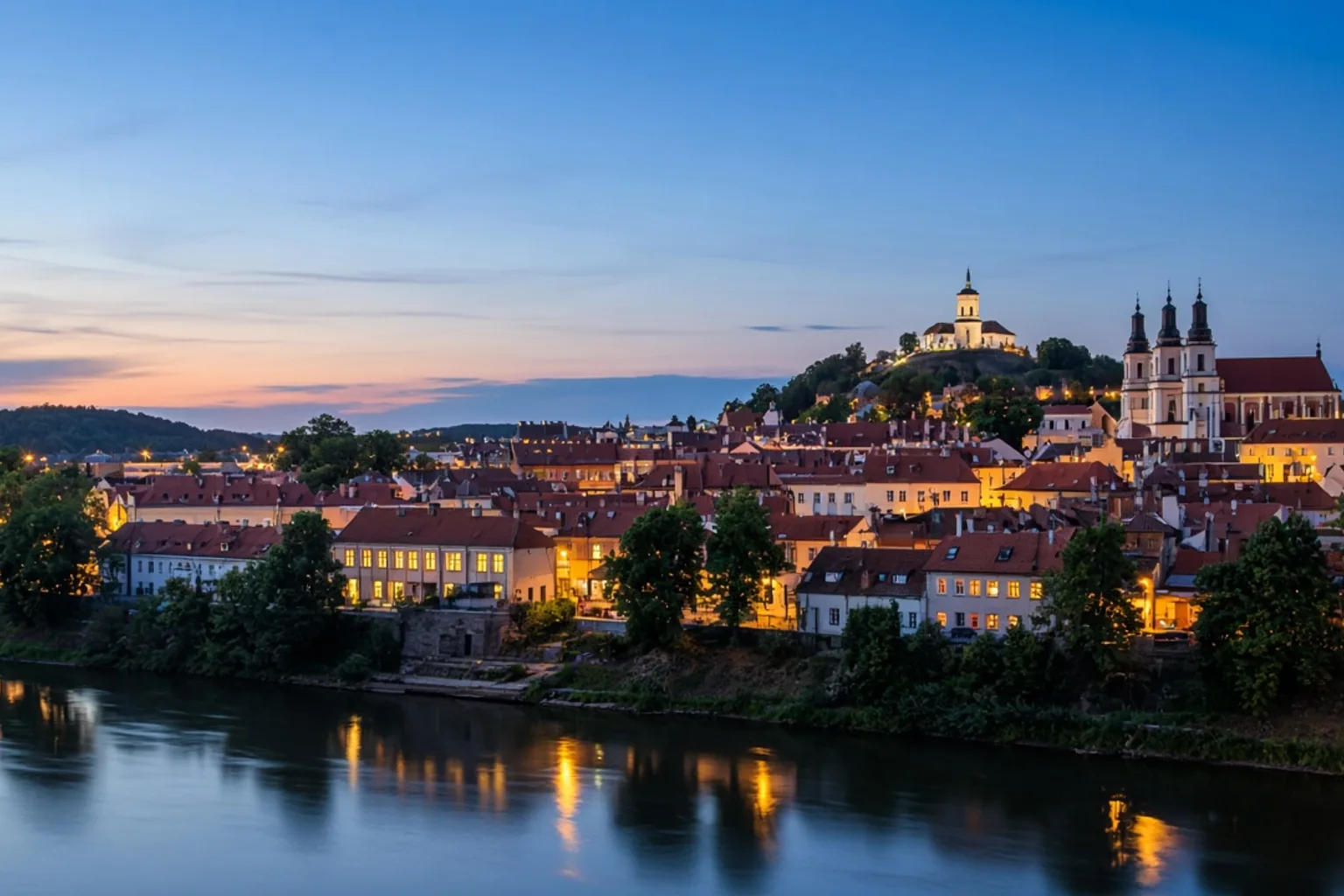 Vilnius old town and the Neris at dusk, no people, no readable text